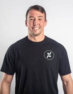 headshot of cody taylor the lead trainer at qntm fit life